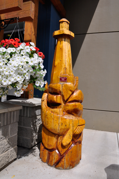 2005 sailors delight chainsaw carving